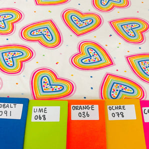 1.07M REMNANT RAINBOW HEARTS COTTON JERSEY